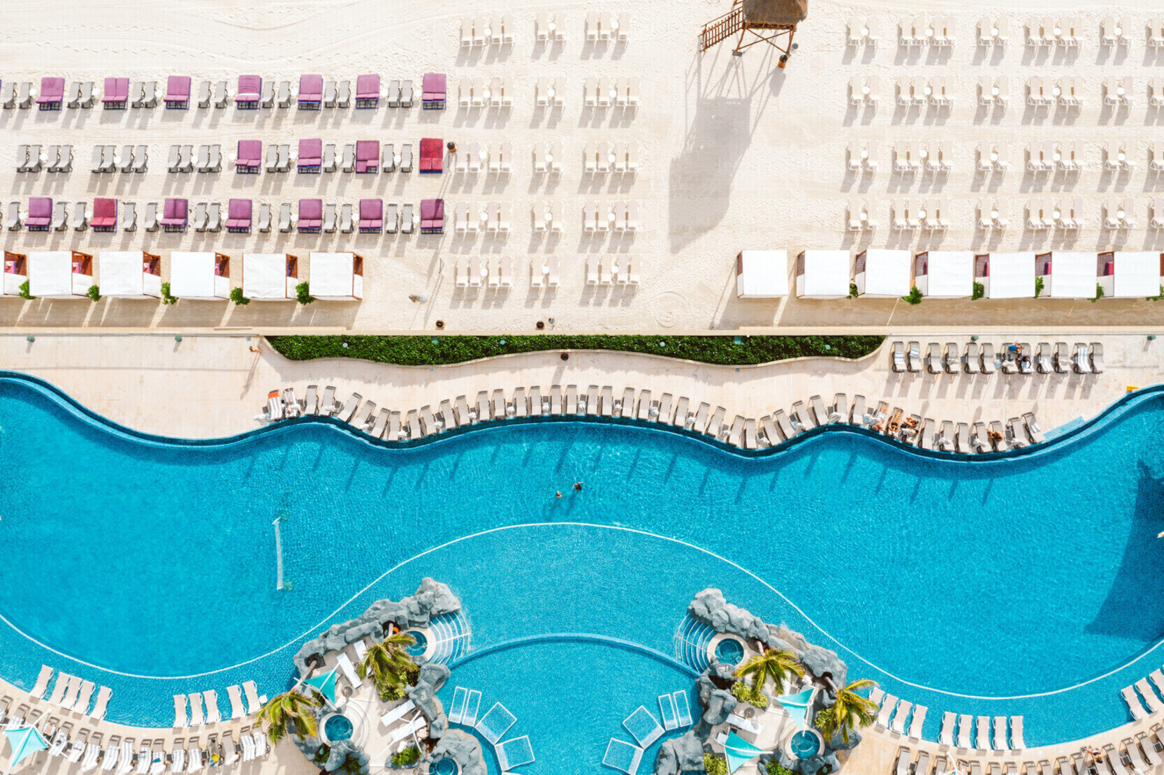 drone footage of the shoreline in front of hard rock hotel cancun